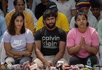 Indian wrestlers take part in a sit-in protest demanding arrest of WFI chief, who they acc