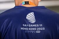 Volunteer attends a news conference ahead of the Gay Games in Hong Kong